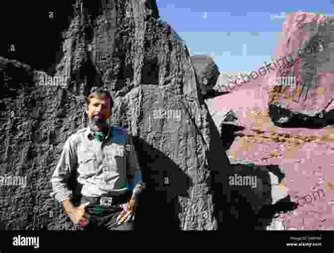 A Photograph Of Edward Abbey Standing In The Desert, Surrounded By Towering Rock Formations Desert Solitaire Edward Abbey
