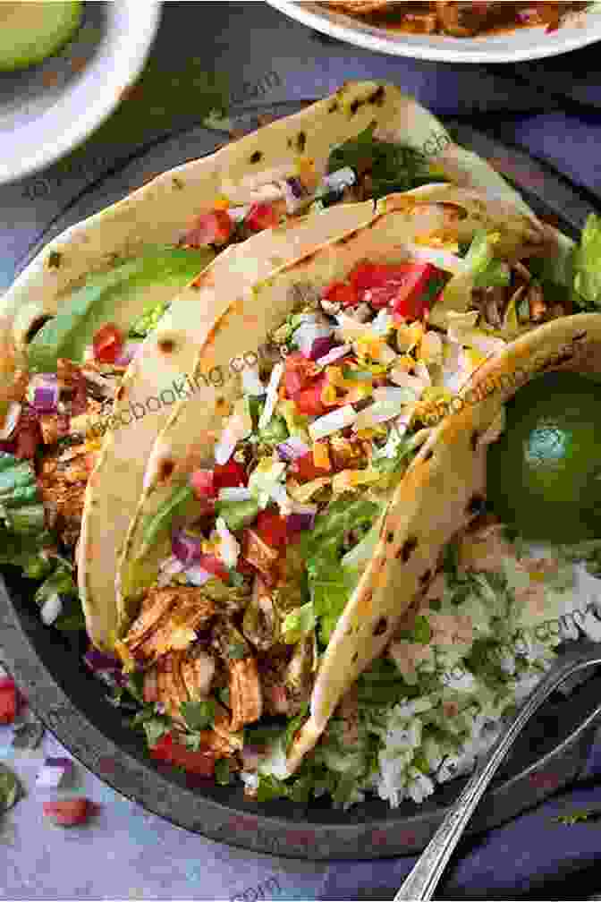 A Plate Of Tacos Filled With Juicy Chicken, Fresh Vegetables, And Salsa Cheap Eats (Easy Eats) Peter Kalmus