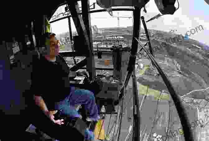 A Skilled Crane Operator Commands A Panoramic View Of A Sprawling Construction Site From The Elevated Cab Of A Towering Crane. Cranes (Big Machines At Work)
