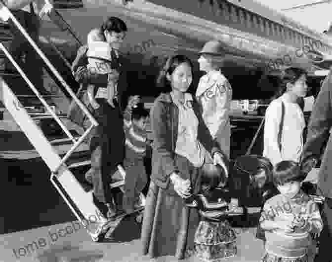 A Vietnamese Family Arrives In Australia, Greeted By Immigration Officials. Small Bamboo: How My Family S Journey On A Leaky Boat Led To Our Wonderful Life In Australia: Growing Up And Growing Old With My Vietnamese Australian Family