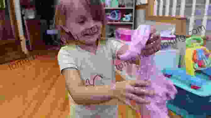 Child Excitedly Playing With Homemade Slime SUPER Science Experiments: Cool Creations: Make Slime Crystals Invisible Ink And More