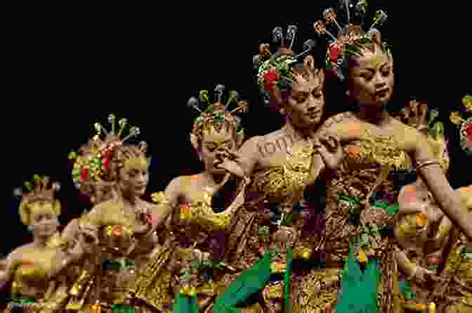 Indonesian Dancers Performing A Traditional Dance, Showcasing The Country's Rich Cultural Diversity Indonesia (Country Explorers) Robin Lim